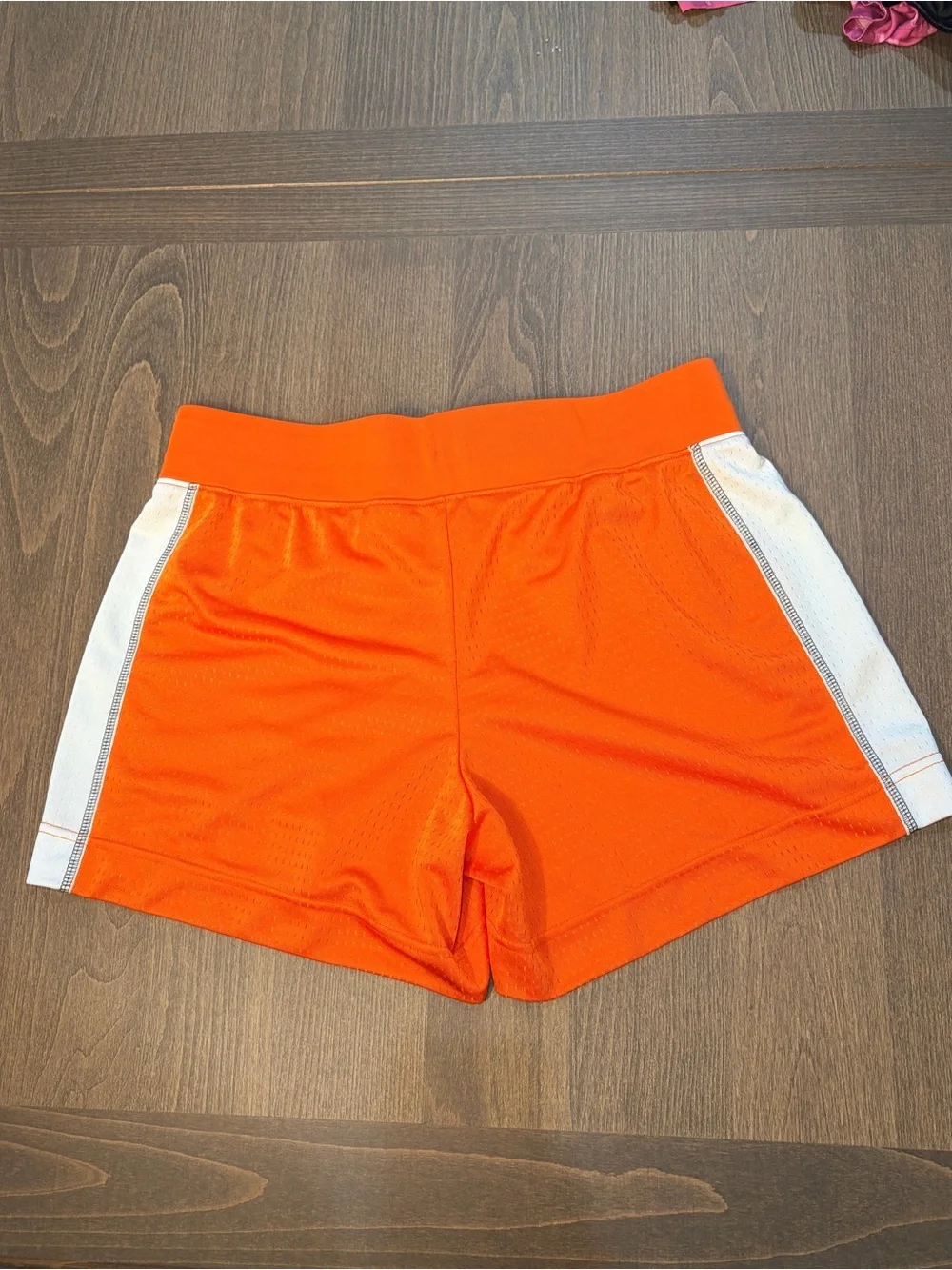 Nike Women's Orange Mesh Athletic Shorts with White Side Panels